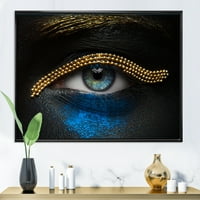 Designart 'Girl Eyes With Gold Chain and Blue Pigment' modern Framed Canvas Wall Art Print